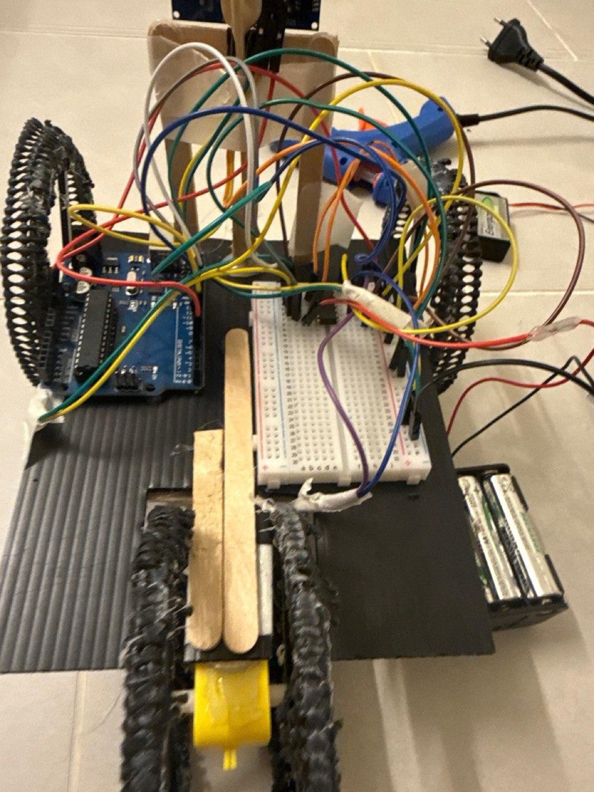Back view of the robot with the right wheel visibly tilted