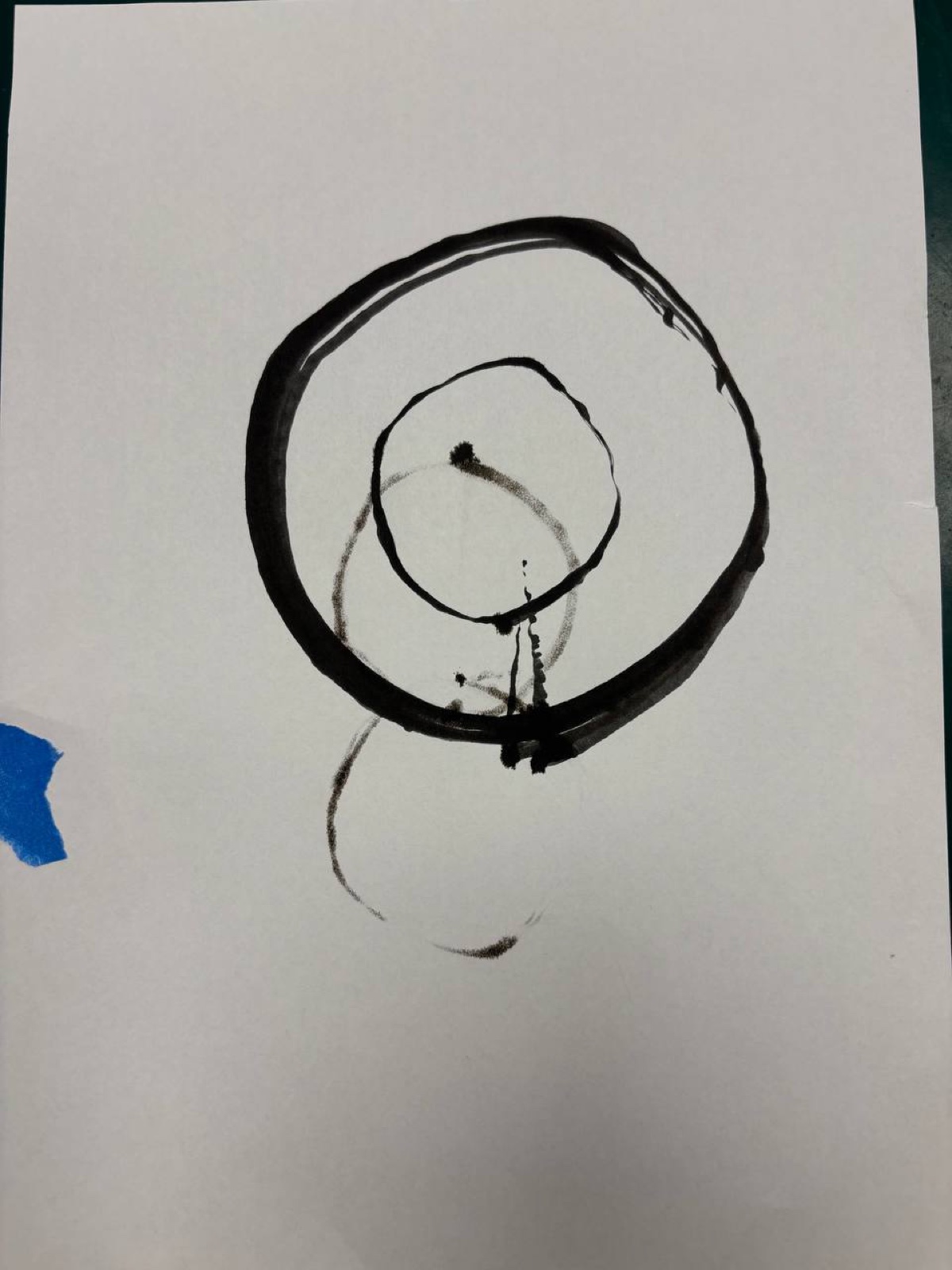 A circle of 60 mm radius drawn by the arm, with leftover arcs from earlier runs